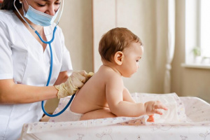 emale-pediatrician-vaccinates-little-baby-boy-immunization-children-concept-happy-little-boy_225144-78